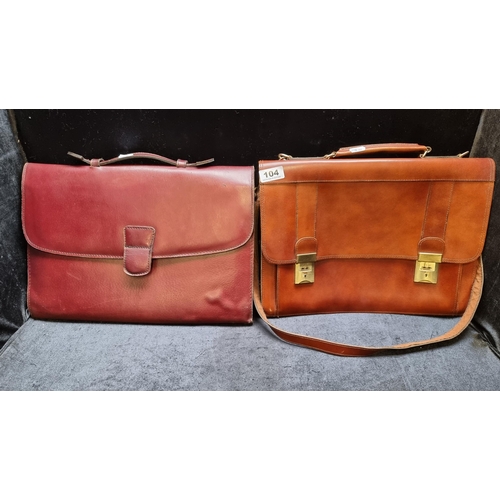 104 - Two vintage genuine leather satchel briefcases. One in a warm chestnut colour with brass fixtures an... 