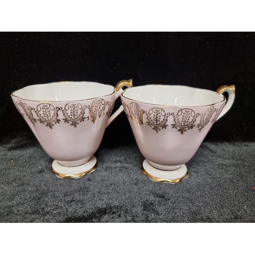 102 - 13 piece vintage Royal Standard Bone China part tea set, including four cups, four saucers and four ... 