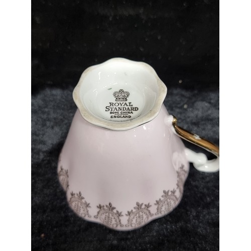 102 - 13 piece vintage Royal Standard Bone China part tea set, including four cups, four saucers and four ... 