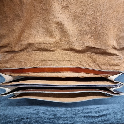 104 - Two vintage genuine leather satchel briefcases. One in a warm chestnut colour with brass fixtures an... 