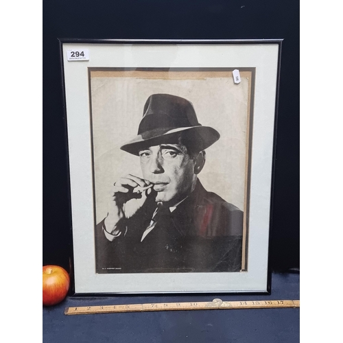 294 - A Vintage portrait print of Humphrey Bogart.