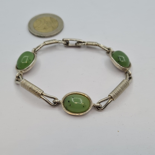 25 - A sterling silver (stamped 925) agate stone bracelet. Length of bracelet 17cm. Stones cold to touch.