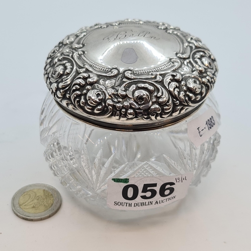 56 - An attractive, large vintage heavy cut glass dish with intricate detail to lid. Marked sterling silv... 