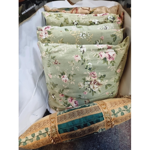 757 - 6 throw cushions including four matching mint green canvas upholstered cushions with a pretty pink r... 