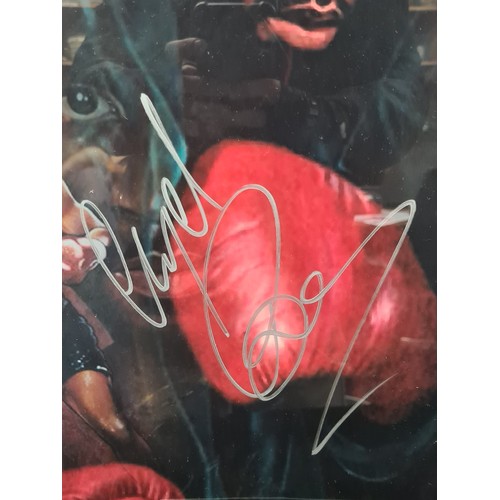 68 - Good sized hand signed print by Nigel Benn 'the Dark Destroyer' with 48 fights, 42 wins 5 losses 35 ... 