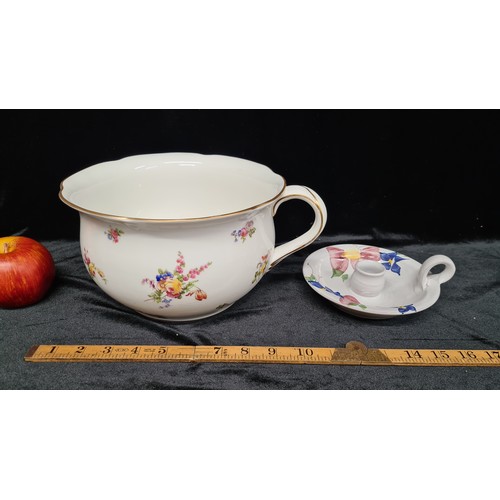 148 - Two items including an antique T. Goode and Co chamber pot with floral motif, along Judy Greene terr... 