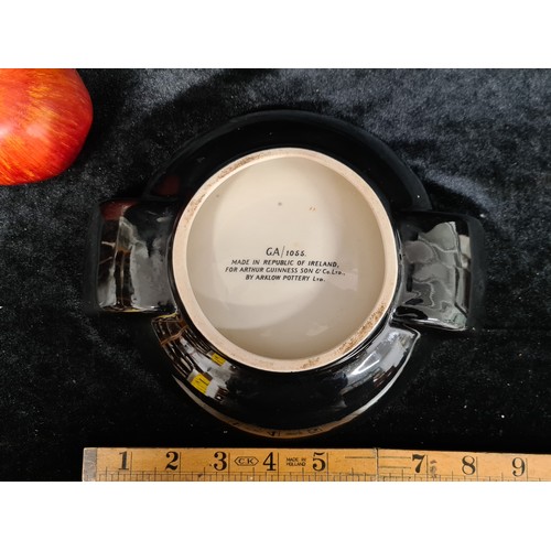 216 - A large vintage Guinness branded ashtray made by Arklow Pottery. Featuring a gilded rim and 