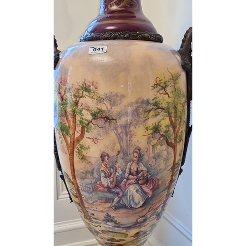 41 - Star Lot : A pair of monumental, hand-painted ceramic urns in a Sevres Style. Featuring Rococo scene... 