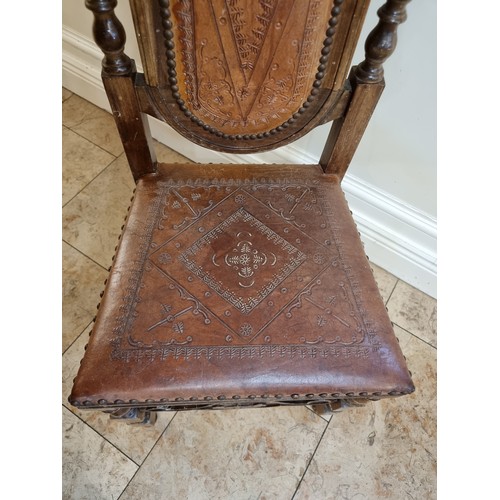 62 - Neat size antique Spanish chapel chair with leather seat and back. 110cm tall, 43cm wide and 38 deep... 