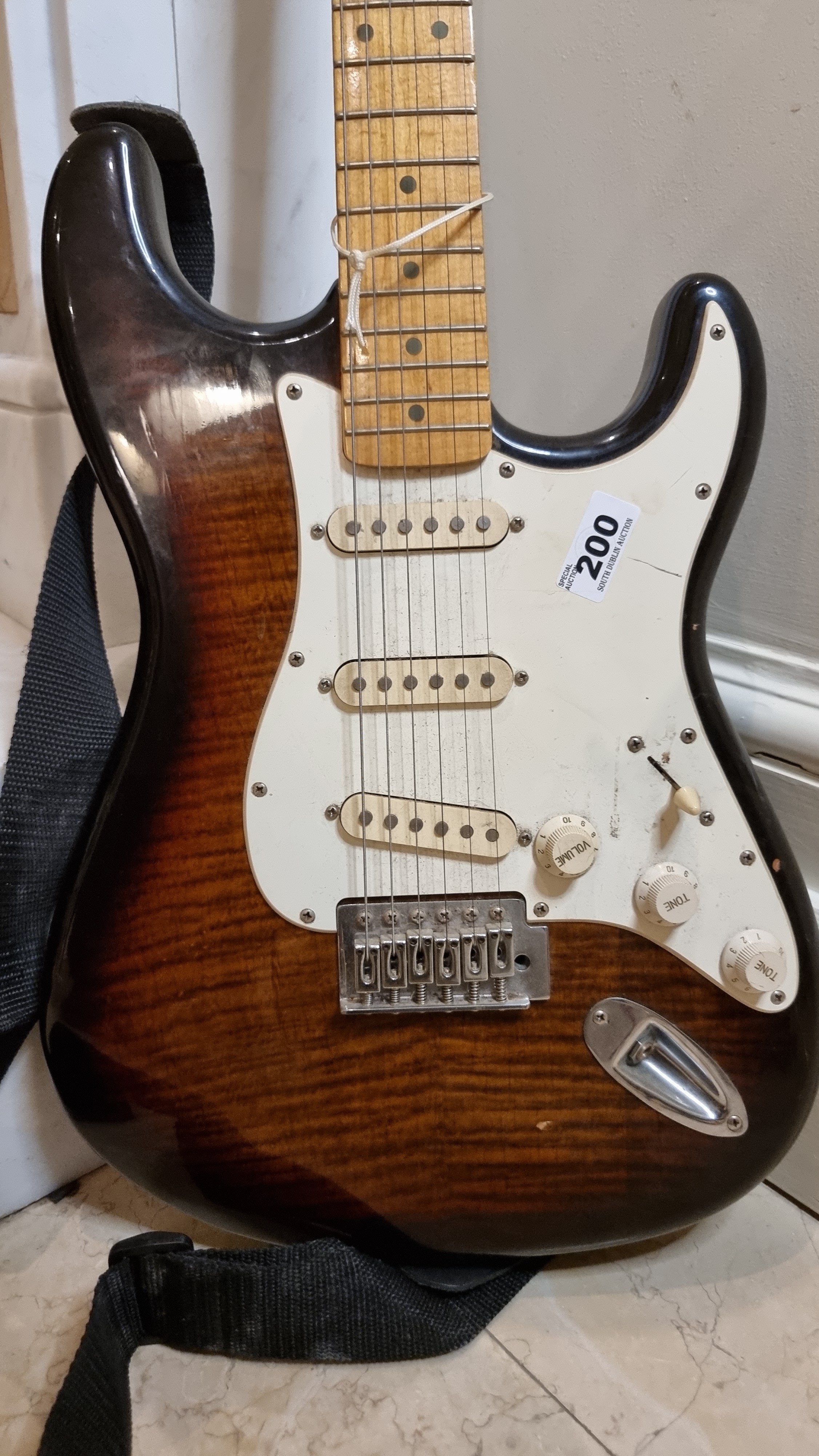 A SX Custom Handmade Traditional Series electric guitar in a