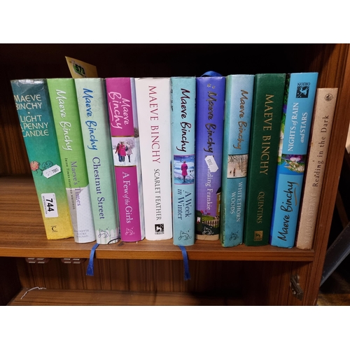 744 - Good shelf of books by Maeve Binchy.