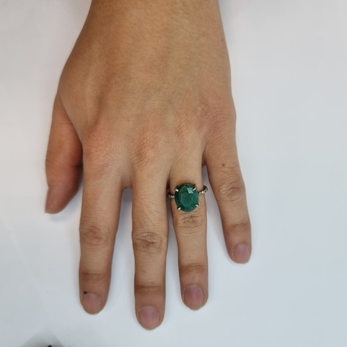 365 - New Sterling Silver Emerald and Diamond ring. Lovely bright oval Emerald 4.2cts Diamonds 0.4 cts Siz... 