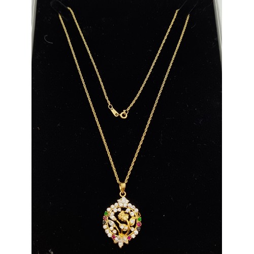 368 - 21k Gold Pendent  with Emerlads, rubies and Sapphires (white stones, not diamonds) On a nice long 18... 