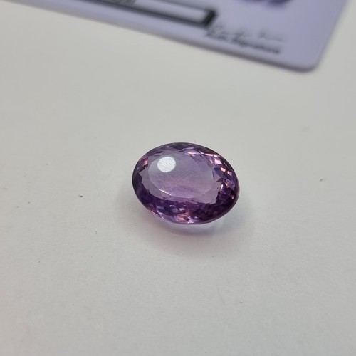 371 - Super Natura amethyst 10.8 cts In  a lovely oval cut 10.8 cats With COA