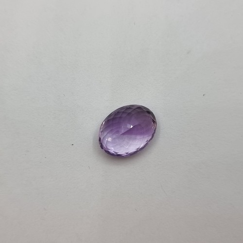 371 - Super Natura amethyst 10.8 cts In  a lovely oval cut 10.8 cats With COA