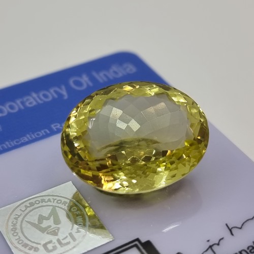 375 - Lovely Lemon quartz Oval gemstone. 25 cts With COA.