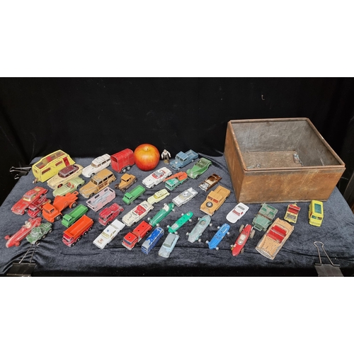 131 - A collection of 40 model vehicles including a Dinky Toy Four Berth Caravan, and a Corgi Rice Pony Tr... 
