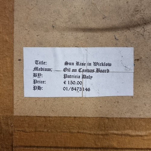 69 - A beautiful original oil on canvas board titled 'Sunrise on Wicklow' showing a soft landscape with a... 