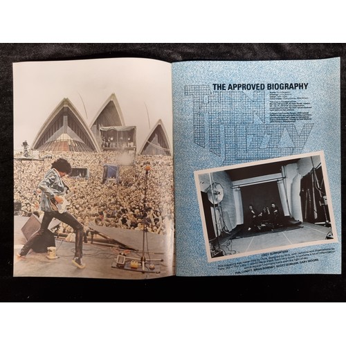 93 - A copy of Thin Lizzy The Approved Biography from 1979 with interviews from the band members, photos ... 