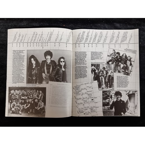 93 - A copy of Thin Lizzy The Approved Biography from 1979 with interviews from the band members, photos ... 