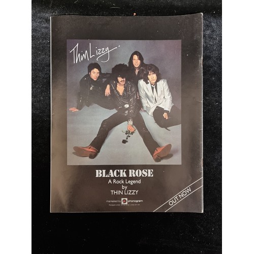 93 - A copy of Thin Lizzy The Approved Biography from 1979 with interviews from the band members, photos ... 