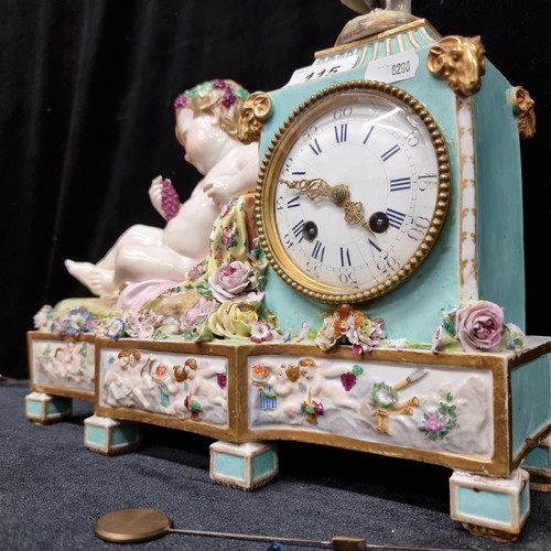 115 - Star Lot : An impressive antique Meissen porcelain figural mantel clock with a young reclining Bacch... 