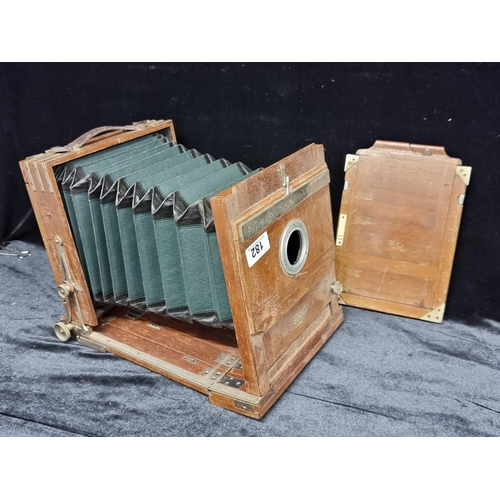 182 - A Curt Bentzin Gorlitz Field Camera c.1915 in highly polished wood with nickel fittings and many set... 