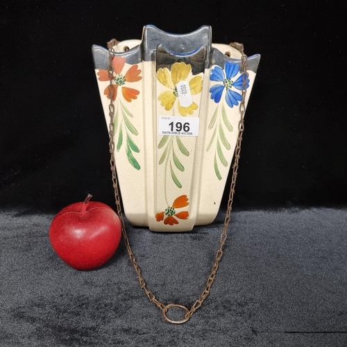 196 - A very pretty, hand painted Arthur Wood wall pocket vase with original hanging display chain; a love... 