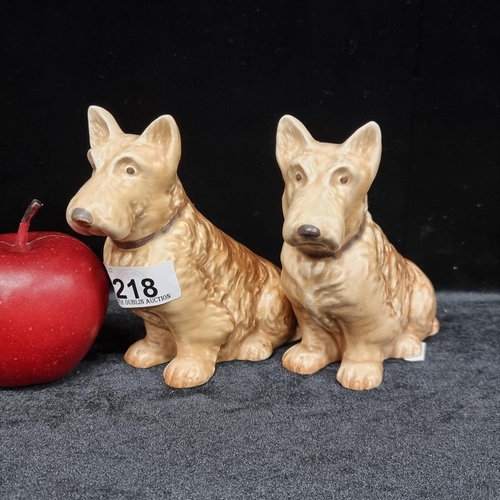 218 - Two Sylvac figurines of two proud terriers marked 205 to base.
