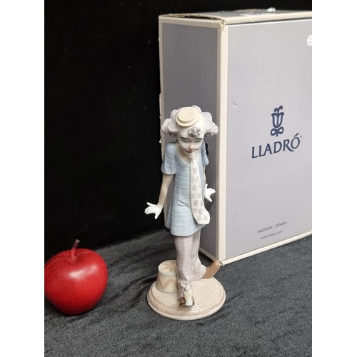 221 - A lovely Lladro hand made porcelain figure of a clown titled 'Circus days', numbered 6919. In excell... 