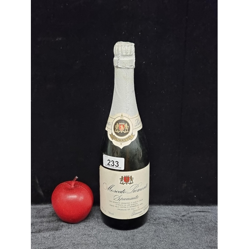 233 - An unopened bottle of Moscato Piemonte Spumante sparkling wine in 75cl .
