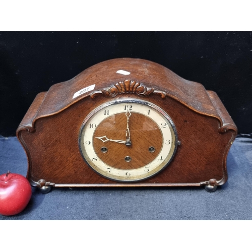 407 - An unusual vintage chiming mantle clock of German origin with an original glass face and metal ball ... 