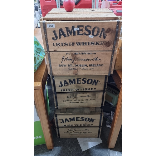 67 - 3 Jameson Irish Whiskey branded wooden crates with lids and handles.