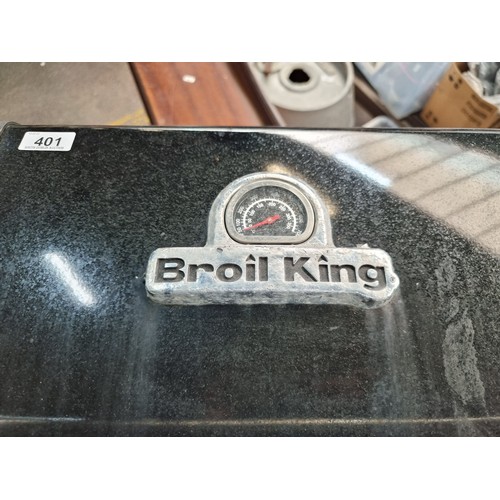 401 - A Broil King gas powered barbecue with storage underneath, gas ring on the left. space either side f... 