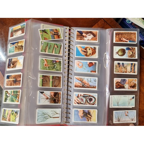 364 - A huge, very fine album of vintage cigarette cards. All in great collection and neatly organized ins... 