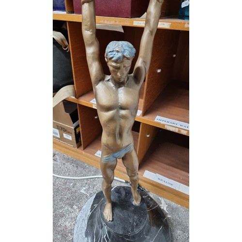 285 - Star Super Star Lot  A highly unusual free standing 1960s Art Deco style sculptural lamp. The column... 