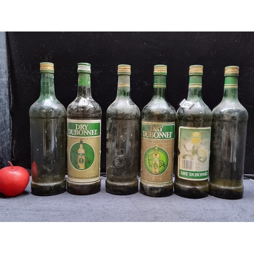 474 - 6 sealed 1L bottles of Dubonnet Dry Wine with a further 3 empty bottles of rare wine 
(1971 Chateau ... 
