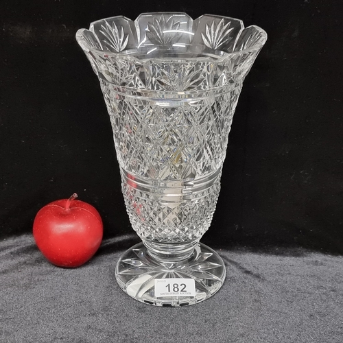 182 - A very large Waterford Crystal trumpet vase in a Georgian style. Finely cut with a crown cut rim, di... 