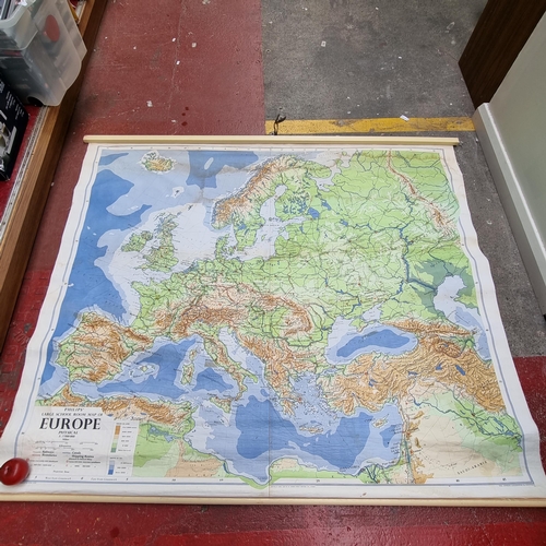 192 - A large vintage wall hanging map by George Philip & Son. Depicting Europe circa 1977. H132cm x W158c... 