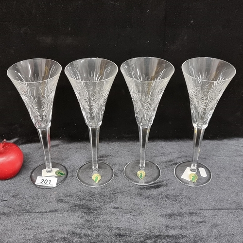 201 - A set of four Waterford Crystal toasting champagne flutes from the 