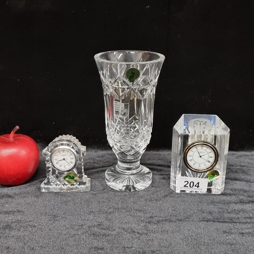 204 - Three Waterford Crystal items, including an etched stemmed vase and a very pretty sconce mantle cloc... 