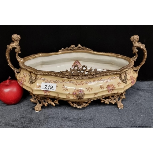 219 - A Wong Lee boat shaped tureen with stunning ornate foliate detail, bronze mermaid figural handles an... 