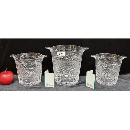 229 - Three Galway Crystal Ice Buckets with a diamond quilt pattern. In good condition. One large example ... 