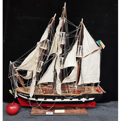 230 - A scale model of the Jeanie Johnston Tall Ship - The Jeanie Johnston is moored at Custom House Quay ... 