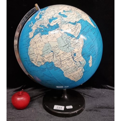231 - A large spinning world globe
