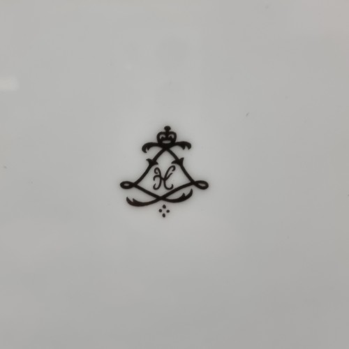 234 - An ornate porcelain dish with cobalt blue glaze, gilt detail and courting scenes. Stamped with ''Sèv... 