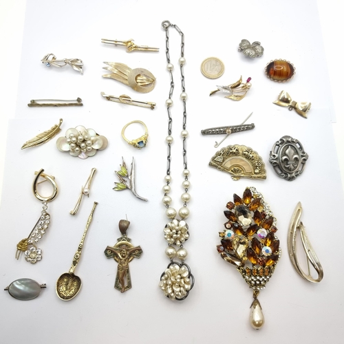 14 - A collection of two boxes of costume jewellery. The first containing nine brooches, some with gemsto... 