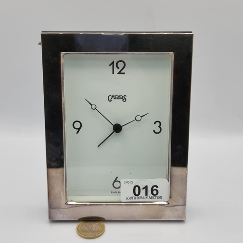 16 - A Carr's sterling silver carriage clock, dimensions 15 x 11.5cm. With original price tag stating €22... 