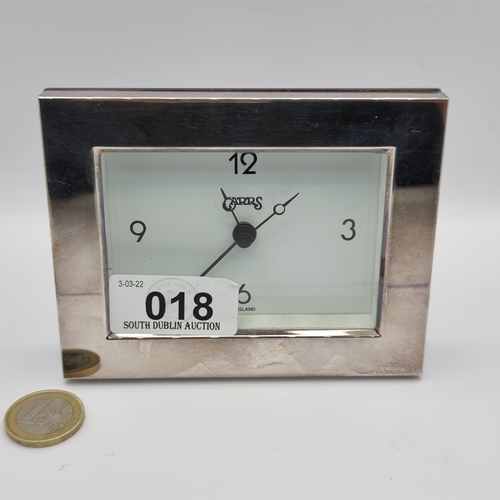 18 - A Carr's sterling silver carriage clock, dimensions 11.5 x 9cm. With price tag stating €195.