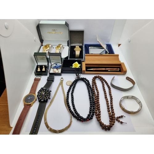 34 - A large collection of jewellery items, consisting of five wristwatches, three brooches, three neckla... 